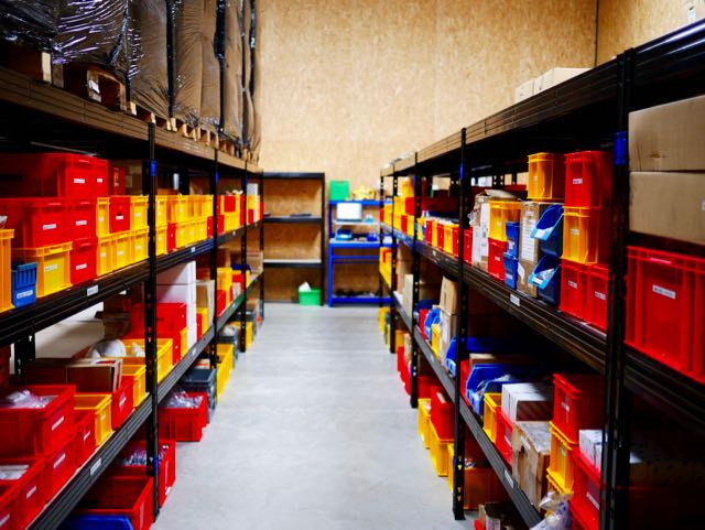 Multi-coloured storage boxes with Carver One parts
